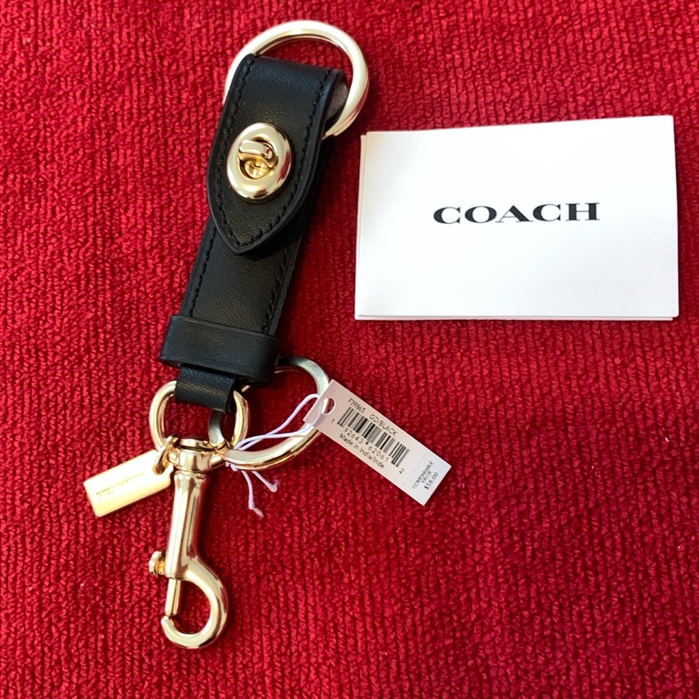 Black and gold Coach keychain